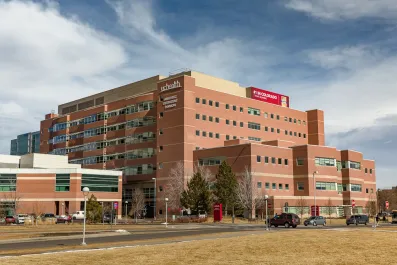 A daytime photo of the exterior of UCHealth University of Colorado Hospital